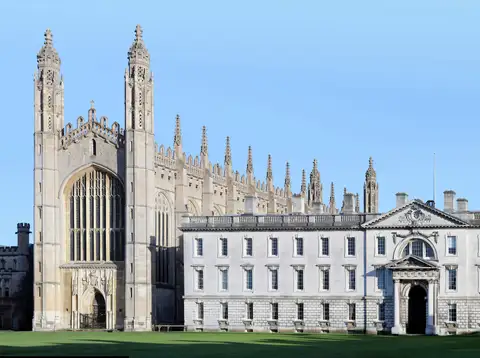 King's College Chapel and the Gibbs Building in Cambridge seen across the lawn on a clear day